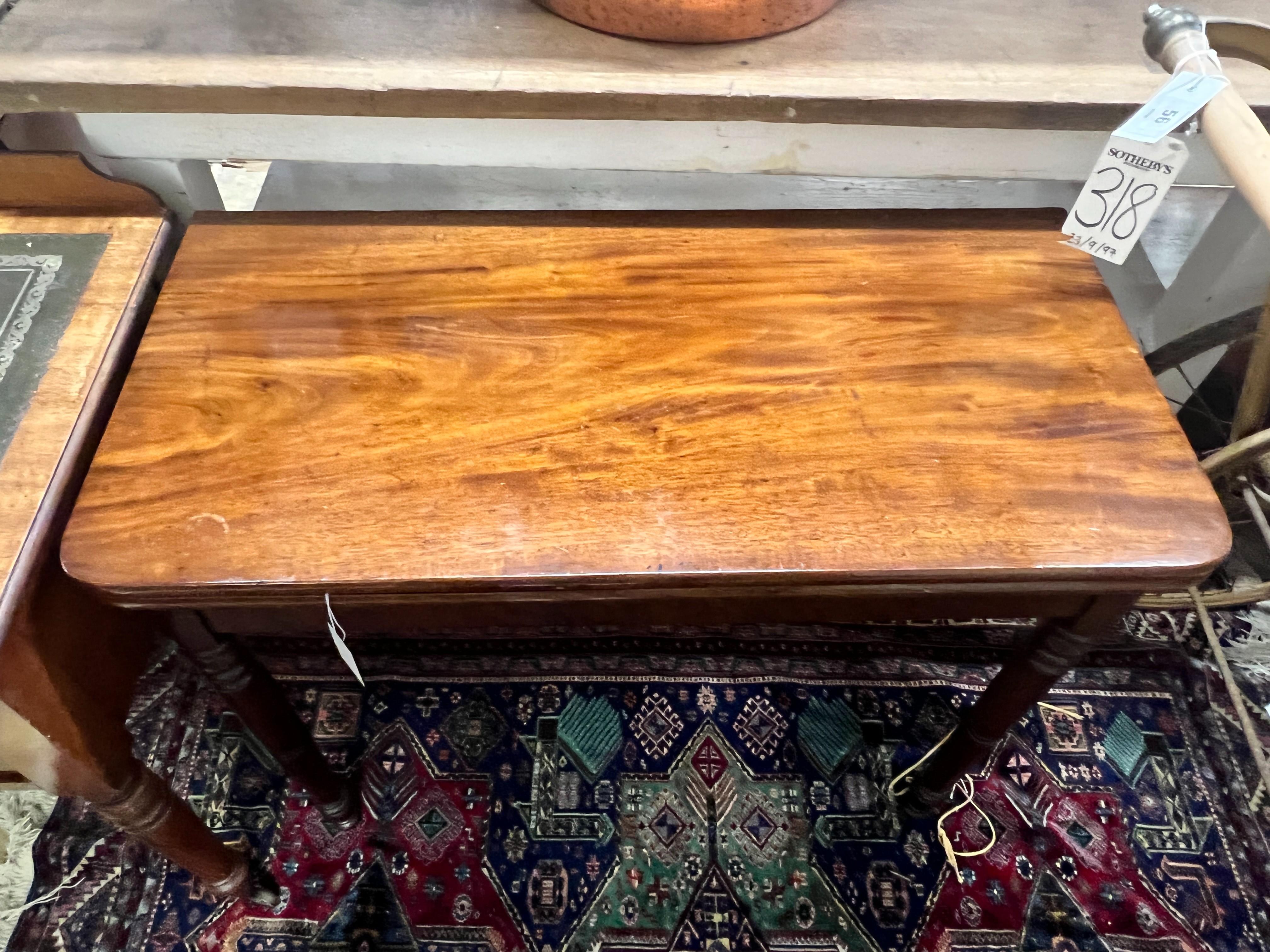A Regency rectangular mahogany folding tea table, width 90cm, depth 45cm, height 74cm